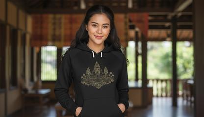 Woman wearing a black hoodie with a temple design in an indoor setting