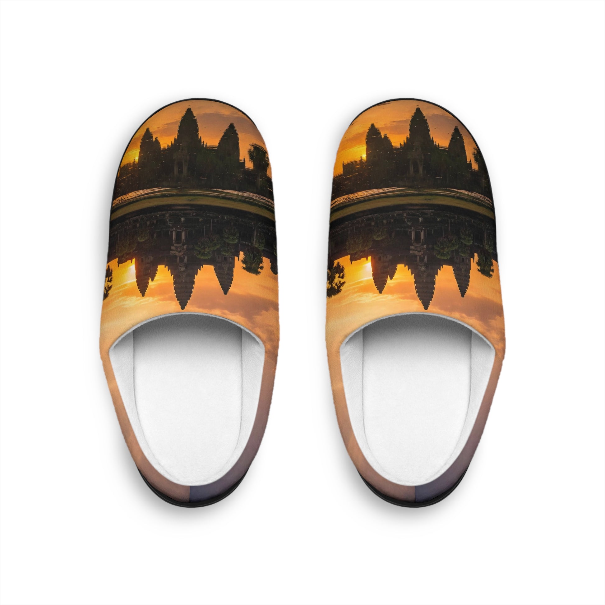 Pair of slippers with a sunset design on a white background