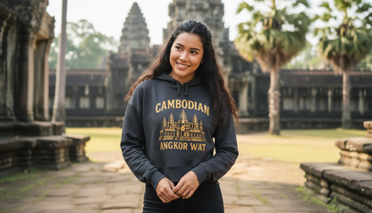 Woman wearing a hoodie with Angkor Wat design in front of Angkor Wat temple.