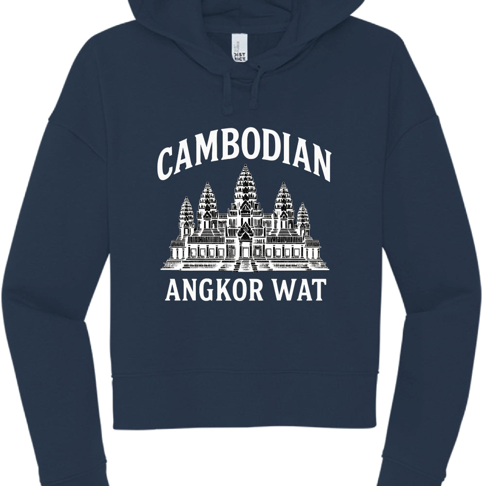 This image features a navy blue, cropped hoodie with a white graphic design centered on the chest.

Design Details
Text: The word "CAMBODIAN" is arched across the top in a white, bold serif font. Below the central illustration, the words "ANGKOR WAT" are printed in a straight, matching font.

Graphic: The center features a detailed, white line-art illustration of Angkor Wat, the famous temple complex in Cambodia, showcasing its iconic five towers (prasats) and tiered architecture.

Garment Style:

Color: De