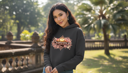 Woman wearing a hoodie with 'Cambodian' text in an outdoor setting
