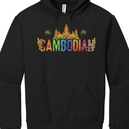 The design is centered on the word "CAMBODIAN" and is rich with cultural and architectural symbolism:

Typography: The word is rendered in a multi-colored, decorative font. Each letter features distinct patterns and bright colors, including red, green, blue, purple, and orange.

Iconic Architecture: A golden, detailed illustration of Angkor Wat sits directly above the lettering.

Natural Motifs: Two green palm trees flank the temple structure.

Traditional Ornaments: Golden, swirling Khmer-style scrollwork 