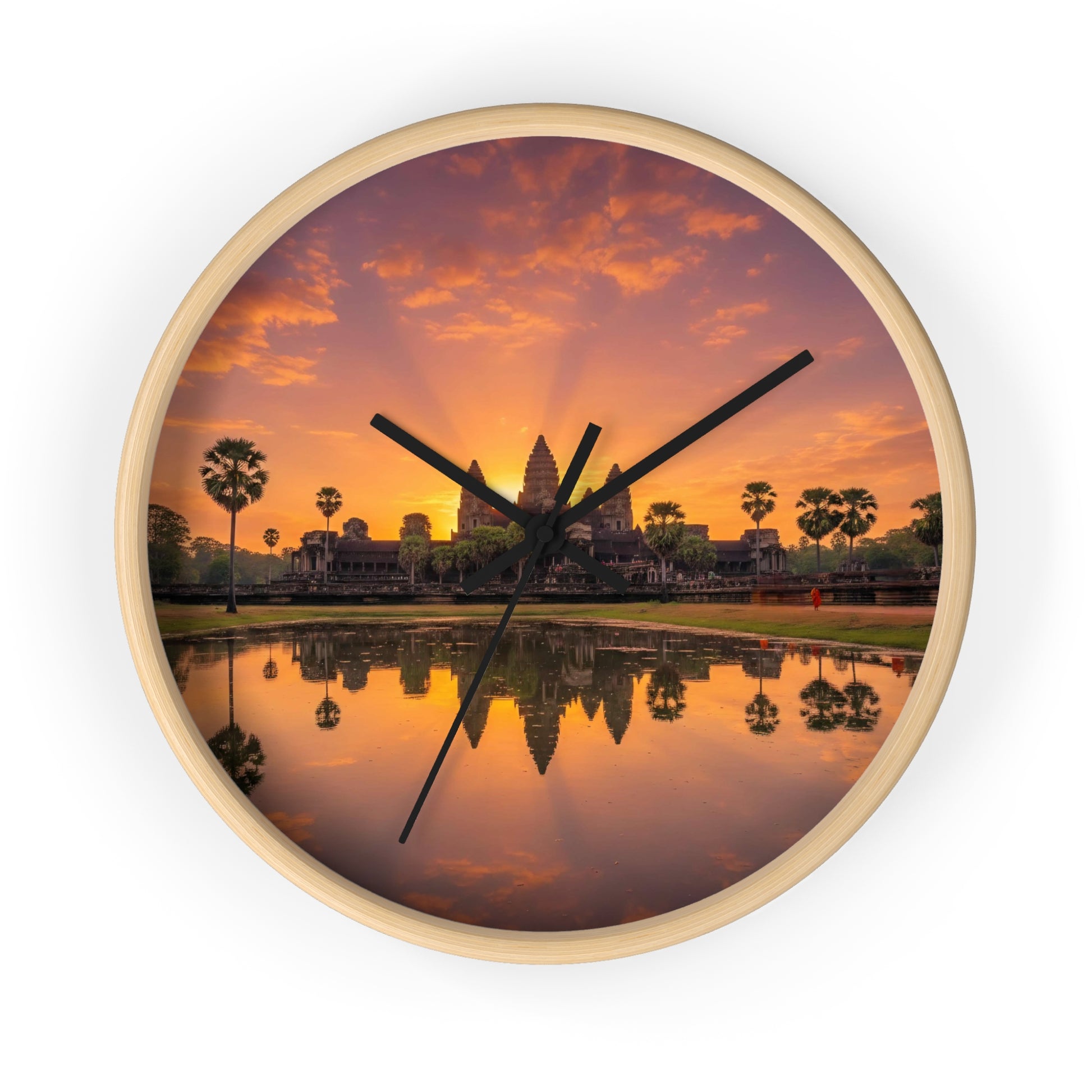 Wall clock with a sunset over a temple reflection in water design