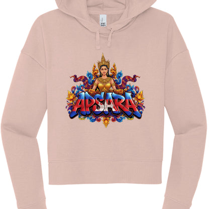 The Text: The word "APSARA" is rendered in a bold, 3D-effect font. The lettering is filled with the Cambodian flag design, featuring blue and red horizontal stripes with the white silhouette of Angkor Wat in the center.

Central Figure: Each hoodie features an illustration of an Apsara, a celestial dancer from Khmer mythology, wearing a traditional golden crown and jewelry.

Apparel Style: Both are cropped-style hoodies with a wide, ribbed waistband and cuffs, matching drawstrings, and a "DISTRICT" brand la