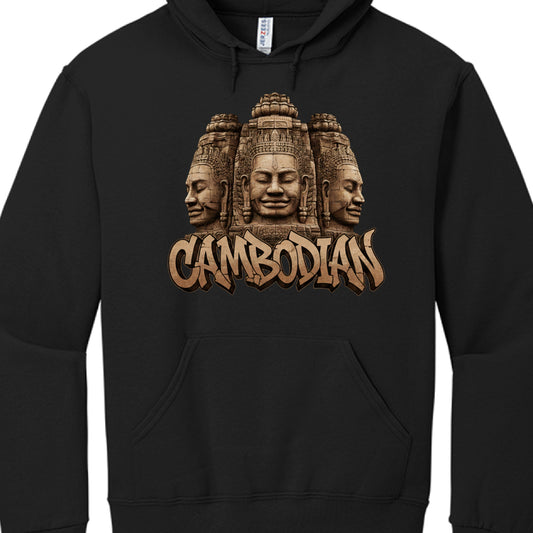 The Imagery: The central focus is a detailed illustration of three giant stone faces carved into a temple structure. These are iconic representations of the Bayon Temple at Angkor Thom, known for its "serene" or "smiling" stone faces.

The Text: Below the temple imagery, the word "CAMBODIAN" is written in a bold, stylized graffiti-like font. The letters have a textured, stone-like appearance to match the carvings above and are outlined in black and gold for a 3D effect.

Color Palette: The graphic uses eart