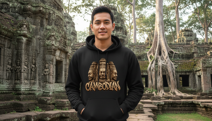 Person wearing a hoodie with 'Cambodian' design in front of ancient temple ruins.