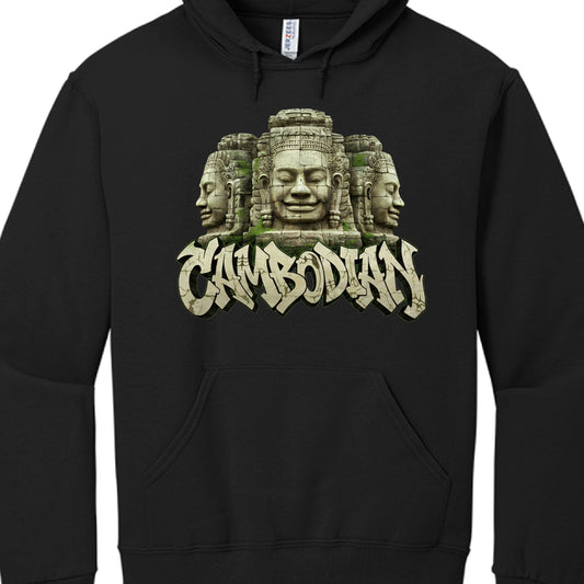 The Imagery: The central focus is a detailed illustration of three stone faces, styled after the famous Bayon Temple carvings at Angkor Thom in Cambodia. The faces have serene expressions and are rendered with a realistic, weathered stone texture, including bits of green moss growing in the crevices.

The Typography: Below the faces, the word "CAMBODIAN" is written in a bold, 3D graffiti-style font. The lettering mimics the same cracked, light-colored stone texture as the faces above, creating a cohesive "a