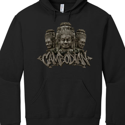 Central Imagery: Three stone-carved faces are stacked in the center. These are modeled after the iconic Bayon Temple towers in Angkor, Cambodia, known for their "smiling" serene expressions and elaborate traditional headdresses.

Typography: The word "CAMBODIAN" is displayed underneath the stone faces in a sharp, graffiti-inspired font. The lettering features a weathered, stone-like texture with cracks and highlights that give it a 3D effect.

Artistic Accents: Small, arrow-like flourishes extend from the e