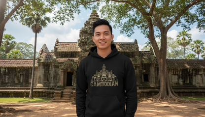 Person wearing a black hoodie with a temple design and 'Cambodian' text, standing in front of an ancient temple.