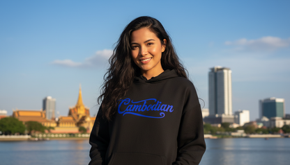 Person wearing a black hoodie with 'Cambodian' text, standing in front of a city skyline.