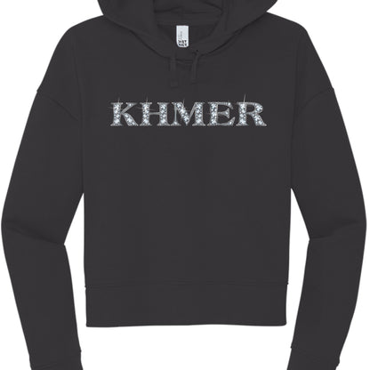 This image features a black, long-sleeved hooded sweatshirt with a bold graphic centered on the chest.

Design Details
The Text: The word "KHMER" is printed in large, uppercase, serif lettering across the chest.

The Style: The letters are filled with a rhinestone or "bling" effect, featuring white and light blue circular patterns that mimic the sparkle of diamonds. Small "glint" or starburst accents are scattered around the edges of the letters to enhance the glittering appearance.

The Hoodie: It is a sta