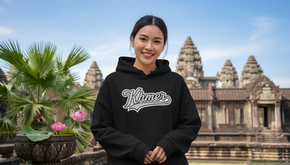 Person wearing a black hoodie with 'Khmer' text in front of Angkor Wat.