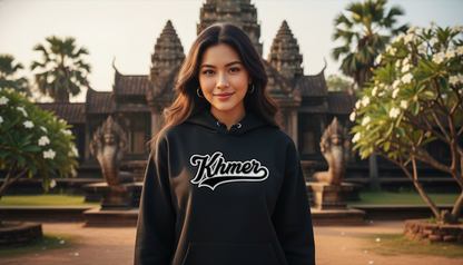 Person wearing a hoodie with 'Khmer' text in front of Angkor Wat.