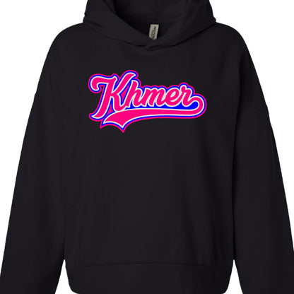 Text: The word "Khmer" is displayed in a stylized, cursive font.

Typography Style: It uses a varsity or baseball-style aesthetic, complete with a thick script and a long "swoosh" tail extending from the final letter under the word.

Color Palette: Unlike the previous monochrome version, this graphic uses a bold pink and blue color scheme:

The main body of the letters is bright pink.

The letters are outlined in royal blue and white to create a high-contrast, layered effect.
