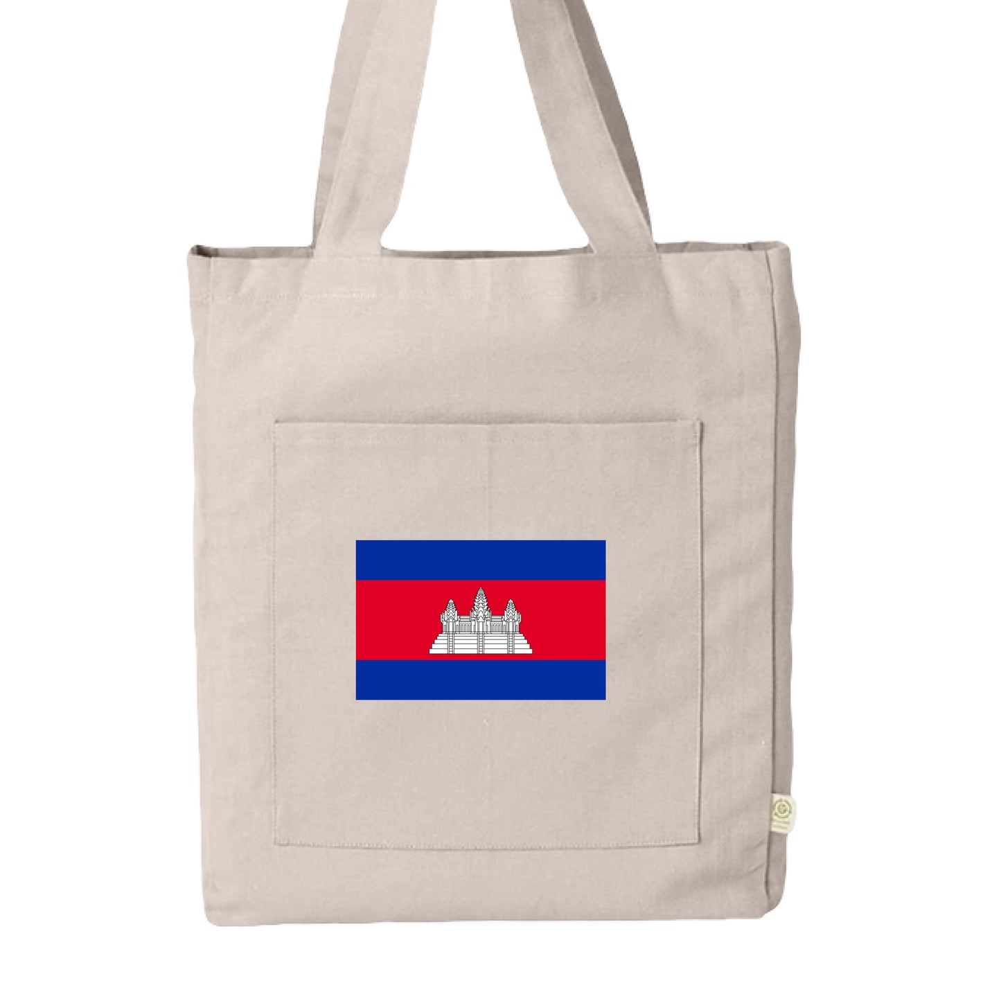 This image displays a neutral-toned canvas tote bag featuring a prominent national symbol.

Design & Features
Material & Color: The bag is made of a light beige or stone-colored fabric, likely a durable cotton canvas.

Front Pocket: It includes a large, square-shaped external pocket stitched onto the front panel.

Graphic: Centered on the front pocket is a print of the national flag of Cambodia, characterized by its blue horizontal stripes at the top and bottom, a central red stripe, and the white silhouett