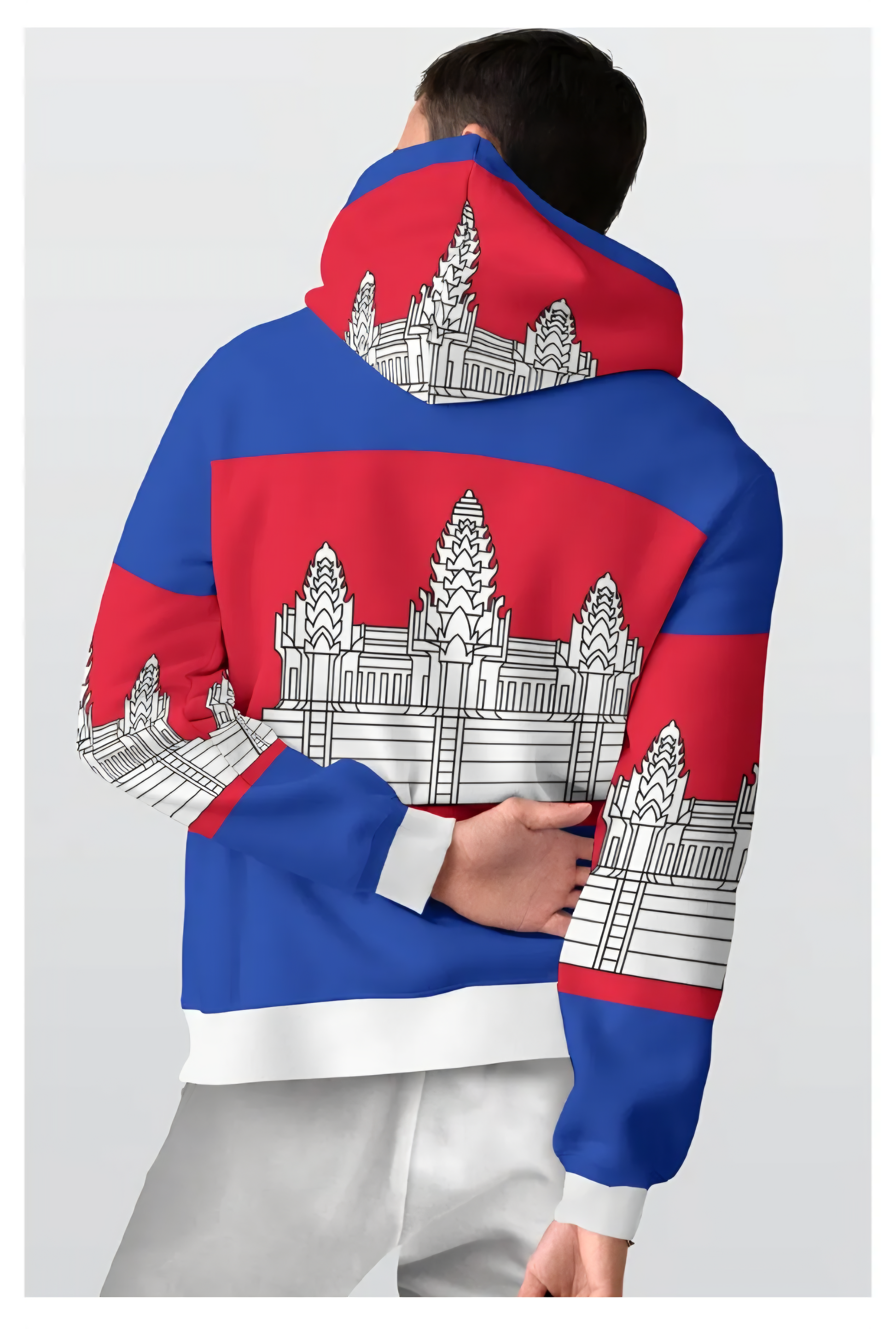Person wearing a hoodie with Angkor Wat design and red and blue color scheme on a white background