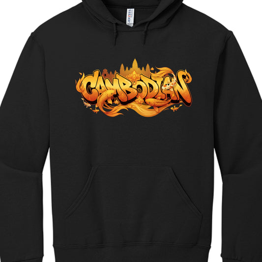 This image features a black pullover hoodie showcasing a vibrant, orange-toned graphic design that celebrates Cambodian culture.

Graphic Design Breakdown
The artwork centers on bold typography intertwined with traditional and natural Cambodian motifs:

Typography: The word "CAMBODIAN" is rendered in a thick, 3D graffiti-style bubble font. The letters feature a warm gradient of yellow, orange, and deep amber.

Aquatic Motifs: Several detailed Koi fish are depicted swimming around and through the lettering. 