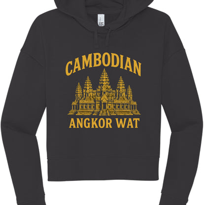 This image features a black, long-sleeved cropped hoodie with a graphic design centered on the chest. The aesthetic is reminiscent of university or travel souvenir apparel.

Design Details
Color Palette: The garment is a matte black, while the printed graphic is a vibrant golden yellow.

Central Graphic: A detailed, stylized illustration of Angkor Wat, the famous temple complex in Cambodia, showing its iconic five towers (quincunx) and tiered architectural structure.

Text: * The word "CAMBODIAN" is arched 