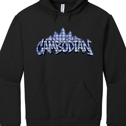 Garment: A standard black pullover hoodie with a front kangaroo pocket and drawstrings at the neck. A "Jerzees" brand tag is visible inside the collar.

Central Graphic: The word "CAMBODIAN" is rendered in a stylized, bold graffiti or "bubble letter" font.

Pattern & Color: The text and the silhouette behind it are filled with a blue and white plaid (checkerboard) pattern, reminiscent of a traditional krama (a sturdy Cambodian scarf).

Iconography: Directly behind the text is the silhouette of Angkor Wat, t