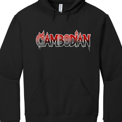 The design is centered on the chest and focuses on bold typography with stylized cultural accents:

Typography: The word "CAMBODIAN" is rendered in a sharp, stylized block font. The letters feature a dark red-to-black gradient and are outlined in high-contrast white.

Cultural Accents:

Naga/Dragon: The letter "C" is creatively integrated with the head and scaled body of a Naga (mythical serpent).

Ornamental Details: Various letters are topped with traditional Khmer architectural flourishes and spires.

Ge