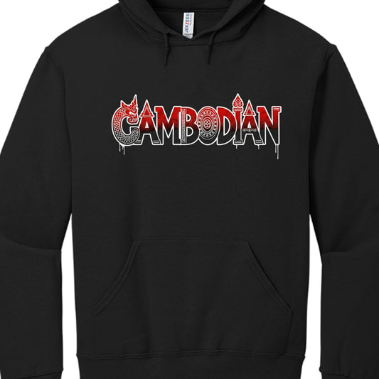 The design is centered on the chest and focuses on bold typography with stylized cultural accents:

Typography: The word "CAMBODIAN" is rendered in a sharp, stylized block font. The letters feature a dark red-to-black gradient and are outlined in high-contrast white.

Cultural Accents:

Naga/Dragon: The letter "C" is creatively integrated with the head and scaled body of a Naga (mythical serpent).

Ornamental Details: Various letters are topped with traditional Khmer architectural flourishes and spires.

Ge