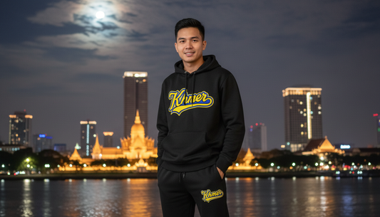 Man wearing a black hoodie with 'River' logo in front of a city skyline at night.