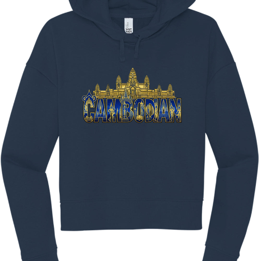 This version utilizes a more intricate, ornate design in gold and blue against a darker navy fabric.

Illustration: A wide, detailed golden silhouette of Angkor Wat spans the chest.

Typography: The word "CAMBODIAN" is printed in large, block letters directly beneath the temple.

Artistic Detail: The interior of the letters features intricate blue-and-gold patterns, including traditional motifs, figures, and floral elements.

Embellishments: The first letter "C" includes a decorative flourish, and a golden 