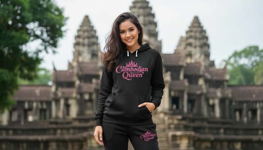 Woman wearing a hoodie with 'Cambodian Queen' text in front of Angkor Wat.