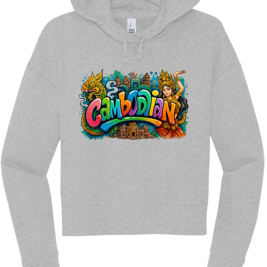 This image features a heather grey cropped hoodie with a vibrant, multi-colored graphic on the chest that blends traditional Cambodian iconography with a modern, pop-art aesthetic.

Graphic Composition
Typography: The word "Cambodian" is written in a bold, bubble-style font. Each letter features a different bright color, including pink, green, orange, blue, and purple, with a glossy finish that creates a 3D effect.

Cultural Icons: * To the left, a traditional golden Naga (mythical serpent) is depicted with