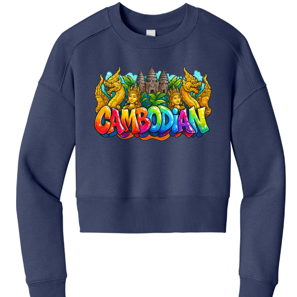 Navy Blue "Cambodian" Composite Design
This design combines the graffiti-style typography with symmetrical cultural elements:

Typography: Uses the same rainbow-colored bubble font for the word "Cambodian" as seen in the peach version.

Symmetrical Elements: The text is flanked by two golden Naga serpents and two Apsara-style figures.

Background: A detailed illustration of Angkor Wat's spires sits prominently behind the central text, surrounded by green tropical leaves and a blue sky background with styliz
