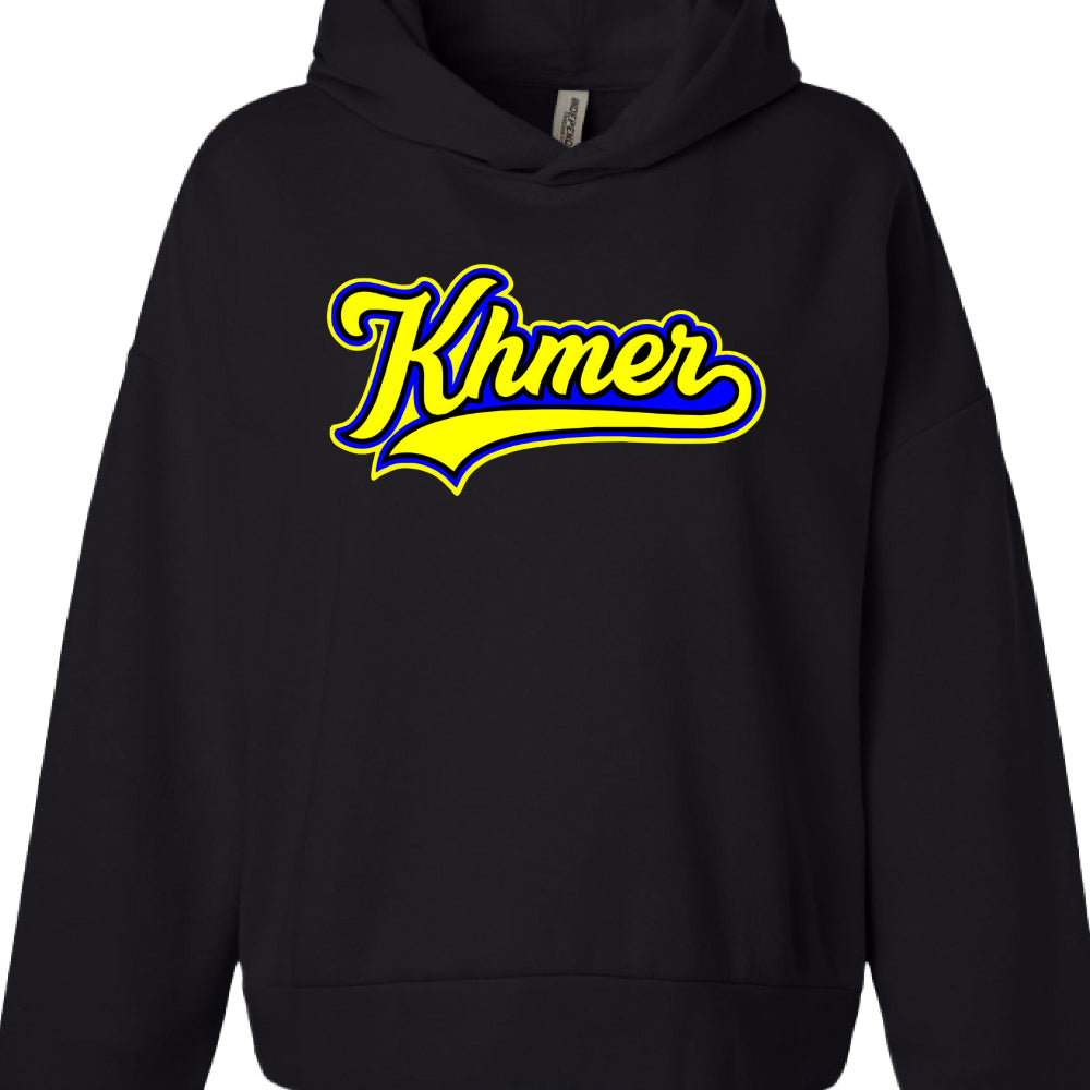 Garment: A black hoodie with dropped shoulders and a front kangaroo pocket.

Text: The word "Khmer" is written in a stylized, cursive script.

Typography Style: Both utilize a baseball or varsity-style aesthetic, featuring thick outlines and a "swoosh" tail extending from the final letter.

Brand: A white "INDEPENDENT" brand tag is visible inside the neckline of both garments.