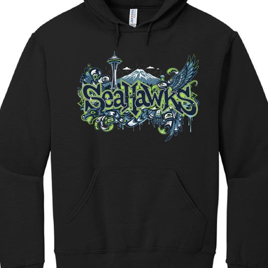 Graphic Design Elements
The central artwork combines sports fandom with urban street art and Indigenous cultural motifs:

Typography: The word "SEAHAWKS" is rendered in a jagged, "wildstyle" graffiti font with a black-and-grey fill and a neon "Action Green" outline.

Regional Landmarks: The background features a grey silhouette of the Seattle skyline, including the iconic Space Needle.

Indigenous Art Influence: The design is framed by patterns inspired by Pacific Northwest formline art, a style originally 