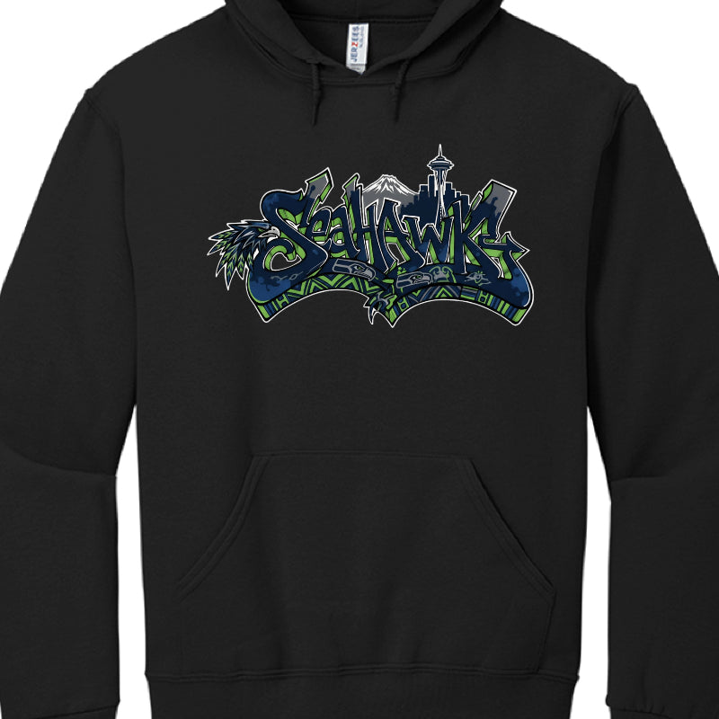 These four images display a collection of pullover hoodies, primarily in navy blue and black, featuring various custom graffiti-style designs dedicated to the Seattle Seahawks. Each design integrates iconic team colors—navy, action green, and wolf grey—with Pacific Northwest imagery.

Graphic Design Varieties
While all hoodies share a common theme, the specific artwork varies across the images:

Cityscapes & Landmarks: Multiple designs feature the Seattle skyline, specifically highlighting the Space Needle 