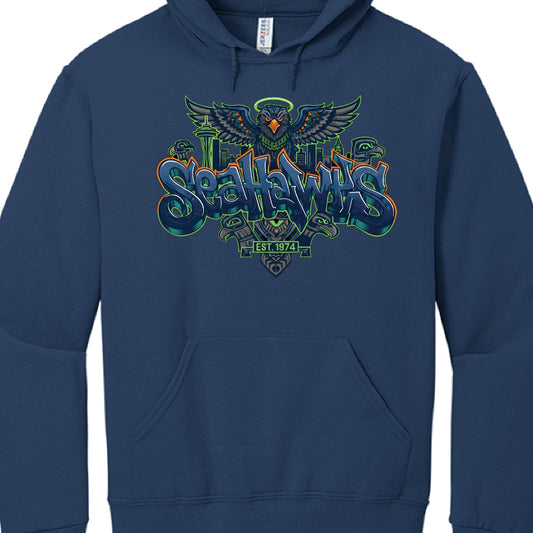 The image displays a navy blue pullover hoodie featuring an elaborate graphic design that celebrates the Seattle Seahawks and the city of Seattle.

Graphic Design Elements
The central artwork uses a stylized graffiti and Pacific Northwest indigenous aesthetic to showcase the team's identity:

Typography: The word "SEAHAWKS" is rendered in a large, 3D graffiti-style font. The letters are colored in the team's signature navy blue with vibrant "action green" and "wolf grey" outlines and accents.
