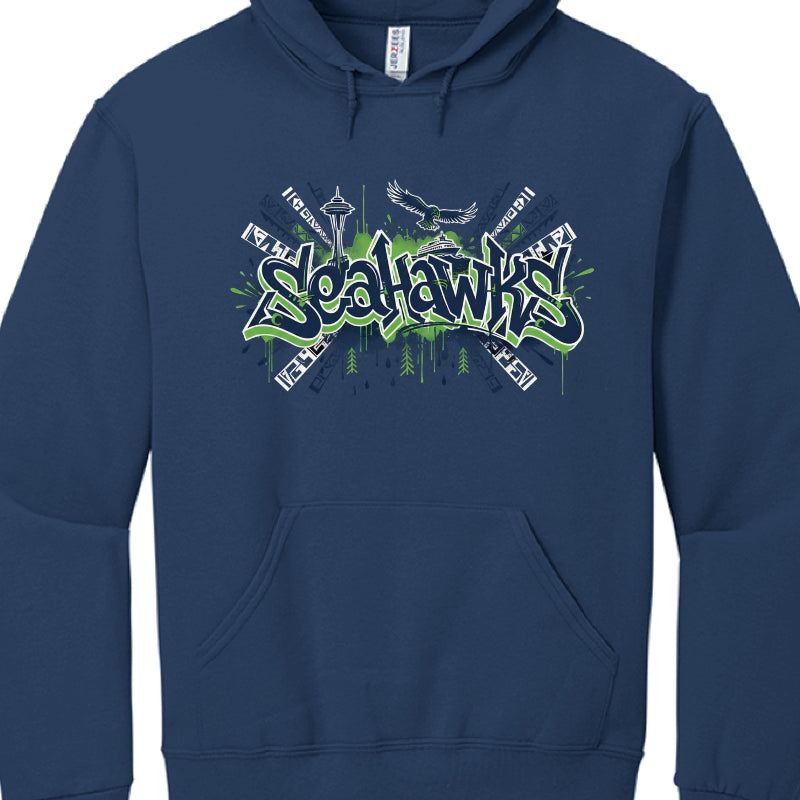This image features a navy blue hooded sweatshirt with a complex graphic design on the chest, showcasing a fusion of sports culture and urban art.

Apparel Details
Garment Type: A pullover hoodie featuring a front kangaroo pocket and matching drawstrings.

Brand: The interior neck tag identifies the brand as Jerzees.

Color: The base fabric is a deep navy blue.

Graphic Design Elements
The central artwork is a highly detailed illustration that celebrates the Seattle Seahawks and the Pacific Northwest throug