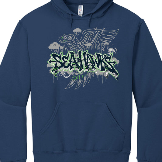The provided image displays a navy blue pullover hoodie featuring a custom graphic design related to the Seattle Seahawks.

Visual Composition
Primary Text: The word "SEAHAWKS" is prominently centered in a jagged, graffiti-inspired font. It is rendered in navy blue with a bright green and white double-outline.

Seahawk Imagery: Behind the text, there is a large, grey illustration of a seahawk (osprey) in a Pacific Northwest Native American artistic style (often referred to as Formline art).

Background Elem