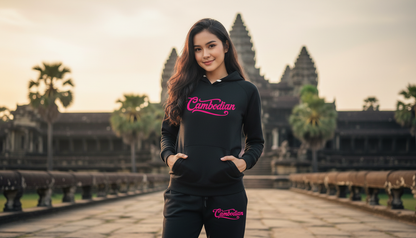 Woman wearing a black hoodie with 'Cambodian' printed on it, standing in front of Angkor Wat.