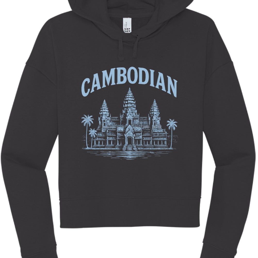 This image features a black, long-sleeved cropped hoodie with a graphic design centered on the chest that celebrates Cambodian heritage.

Design Elements
Garment Style: The hoodie has a modern "cropped" cut that ends near the waistline, featuring dropped shoulders and matching black drawstrings.

Graphic Color: The print is rendered in a light pastel blue, providing a cool contrast against the black fabric.

Illustration: The central image is a detailed depiction of Angkor Wat. This version of the design in