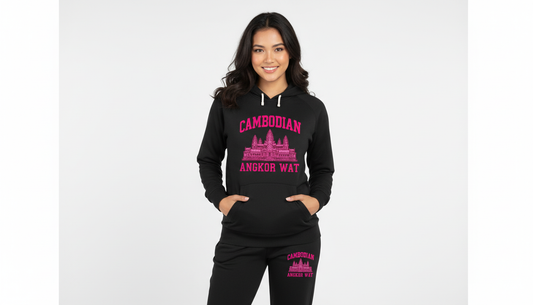 Woman wearing a black hoodie with pink text and graphics on a white background